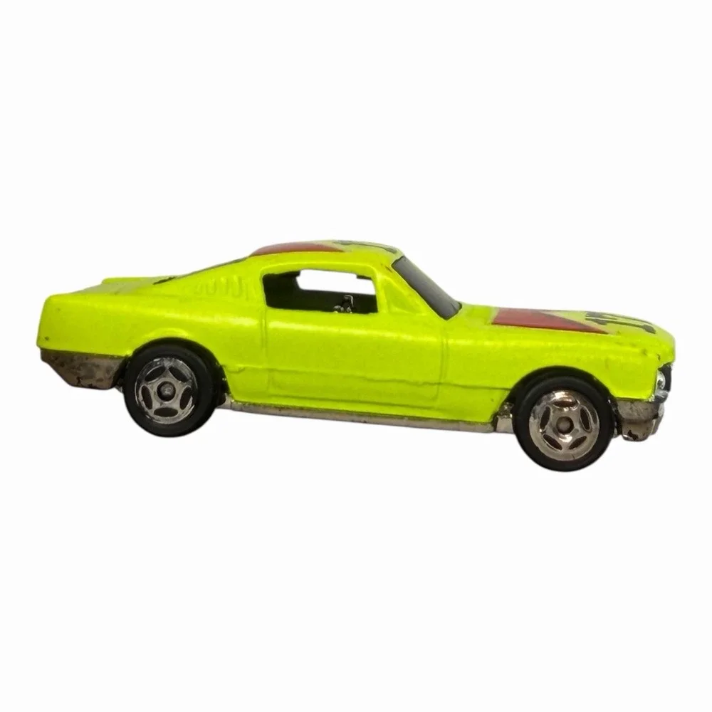Vintage Yellow Diecast Toy Car with Racing Decals‎